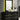Black dresser and mirror with gold accents