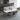 Modern dining room set with a marble table and chairs