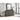 Grey dresser with mirror in a room 