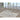Set of 3 glass coffee tables with metal frames 