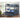 Grey bunk bed with blue bedding 