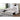 White sectional sofa with storage drawers for living room setting.