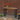 Wooden table with black legs 